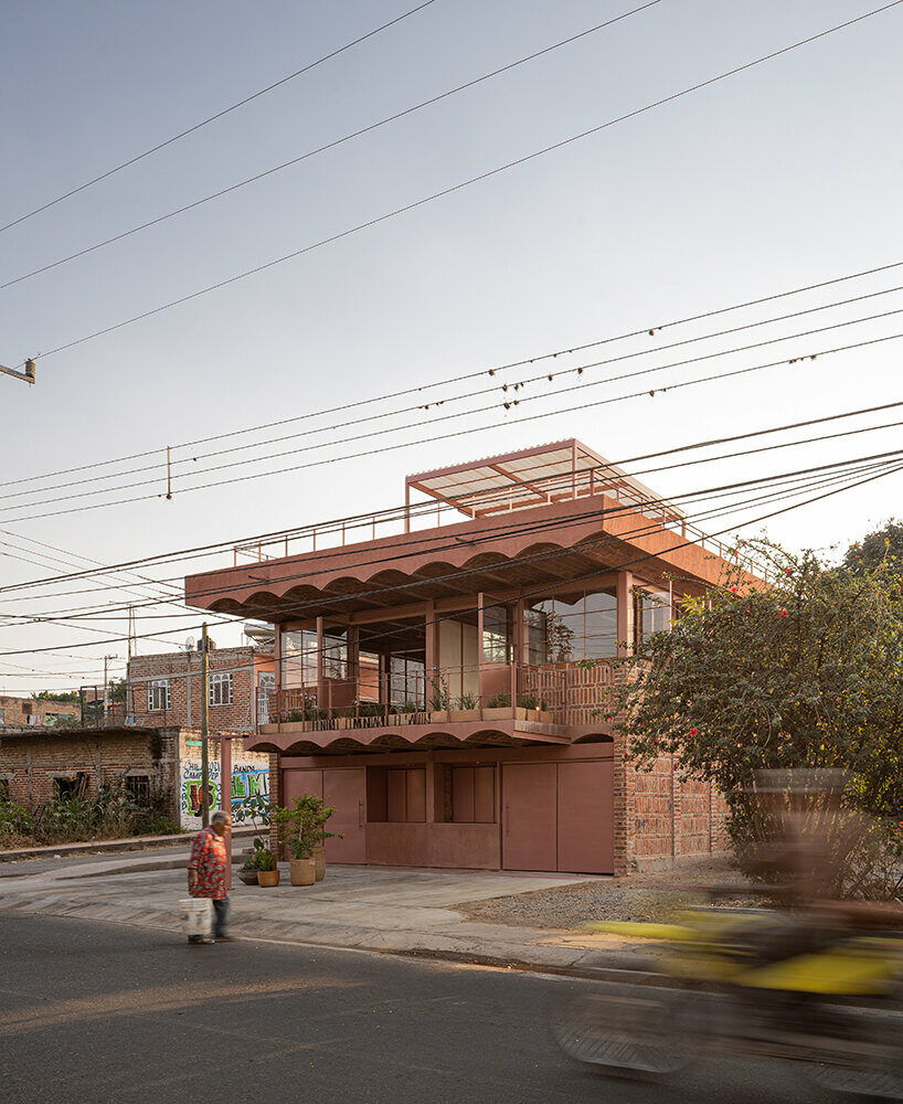 vaulted brickwork community center built by the citizens adorns rural mexico