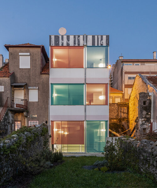 fala atelier fronts 'suspended house' in porto with a vibrant asymmetry