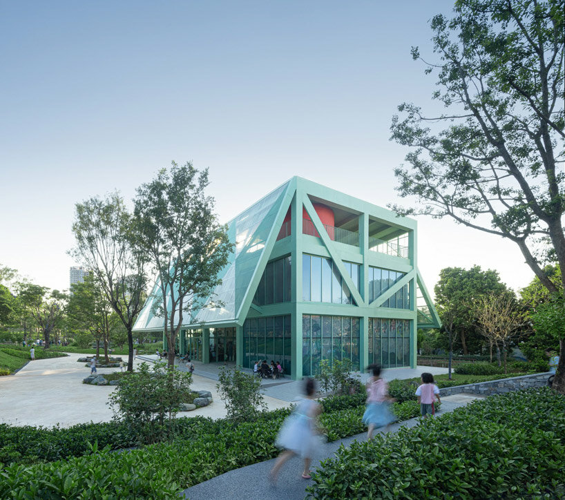 vivid breathable pavilion is nestled within lush children's park in shenzhen, china