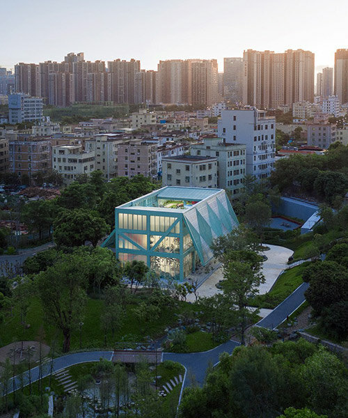 vivid breathable pavilion nestles within lush children's park in shenzhen, china