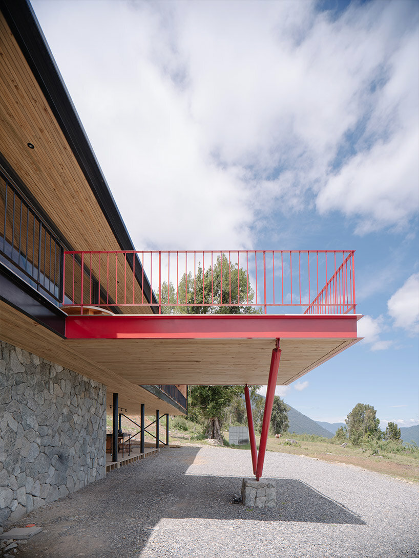 elongated 'la empastada house' frames sweeping vistas of rural chile