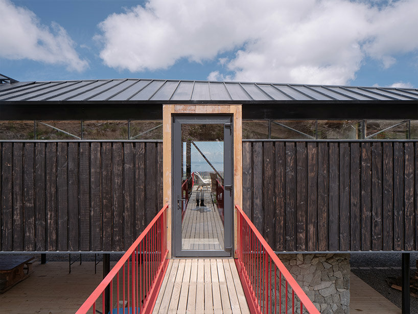 elongated 'la empastada house' frames sweeping vistas of rural chile