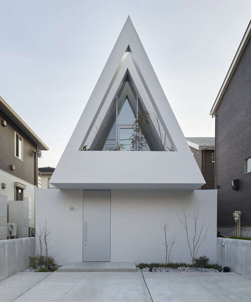a triangular atrium crowns airhouse's new private residence in japan