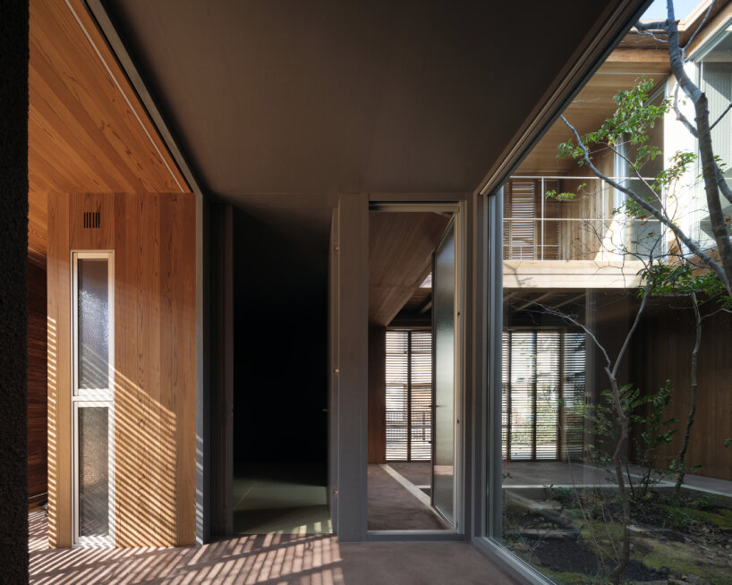 house in nakamachi plays with sunlight through reversible and sliding ...