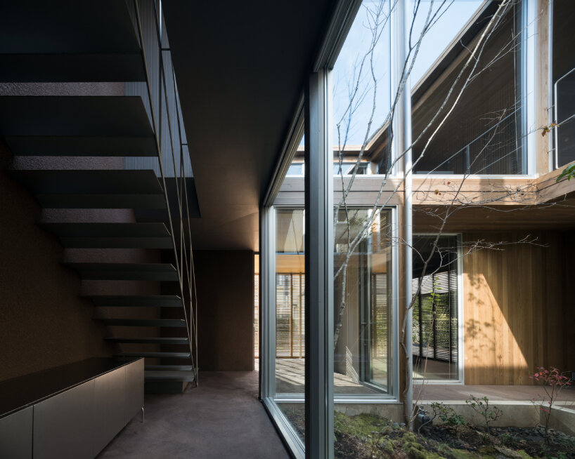 house in nakamachi plays with sunlight through reversible and sliding ...