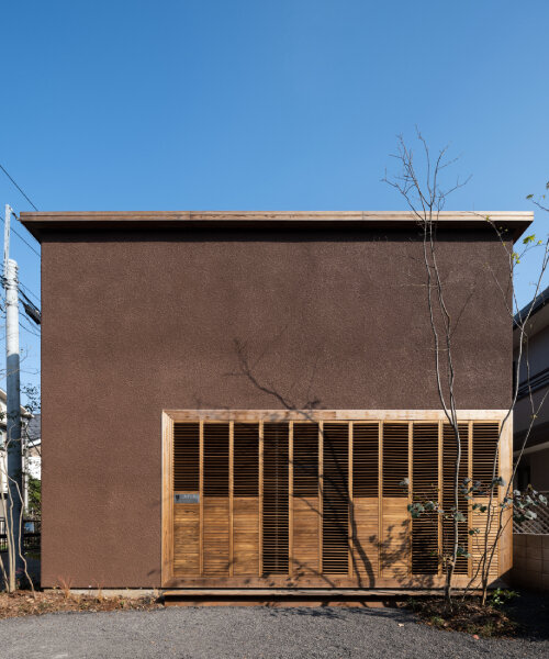 house in nakamachi plays with sunlight through reversible and sliding wooden shutters