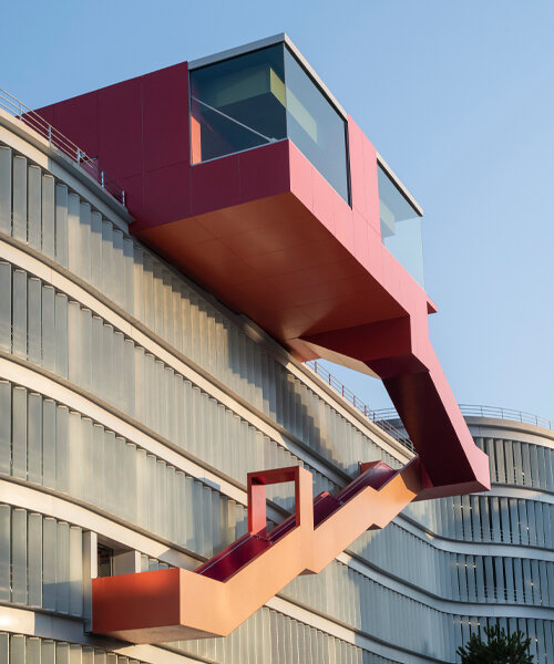 cantilevering red belvedere adorns new parking complex in chambéry, france