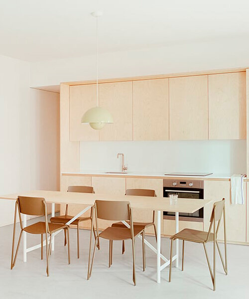 hybrid renovation by SET architects combines flexible living and working in milan