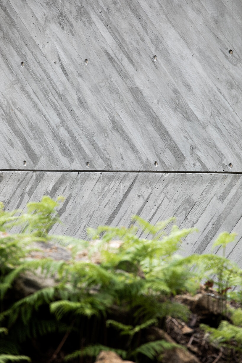 'tâmega' is a sculptural concrete home stretching horizontally across rugged land in portugal