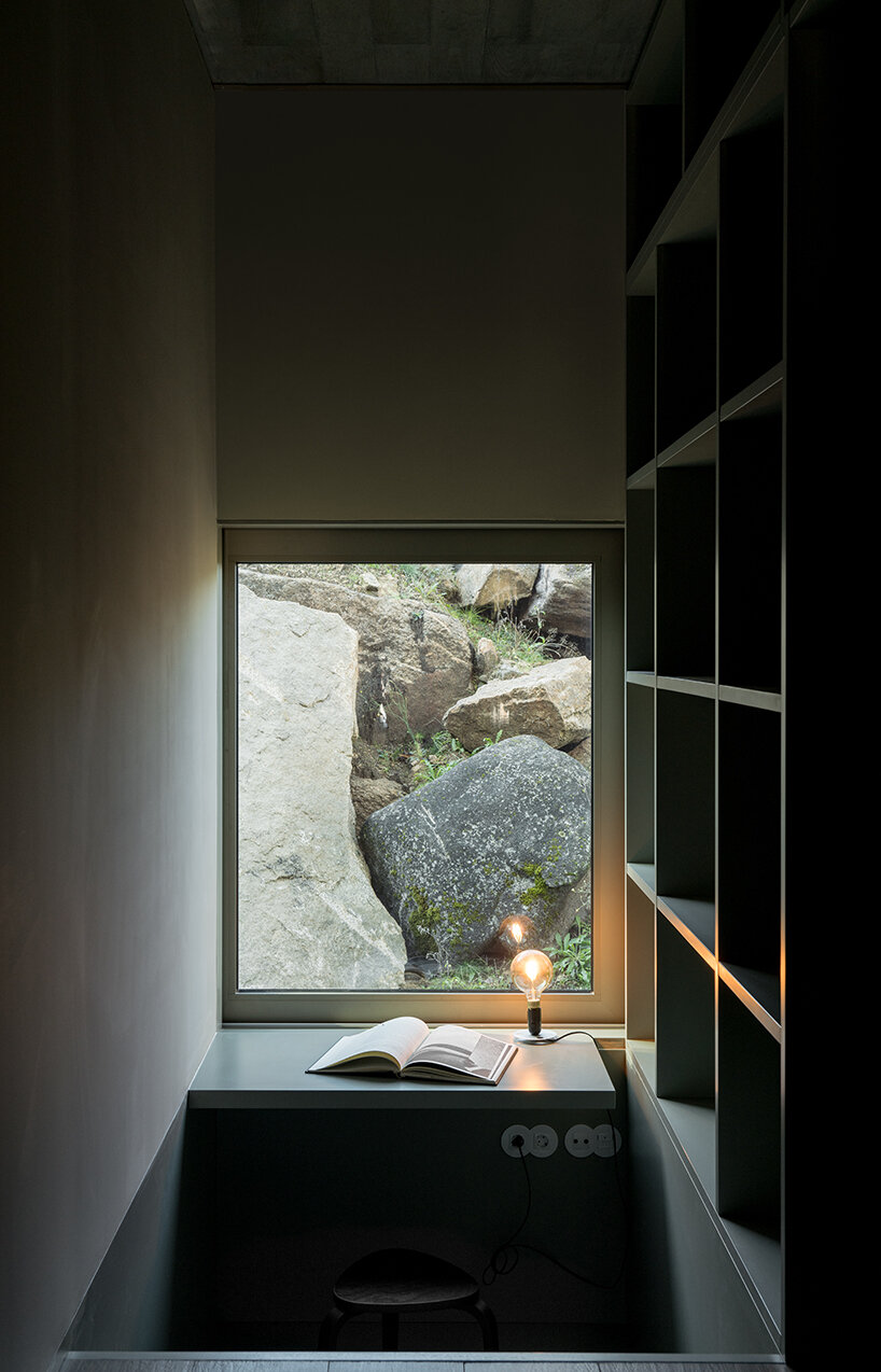 'tâmega' is a sculptural concrete home stretching horizontally across rugged land in portugal