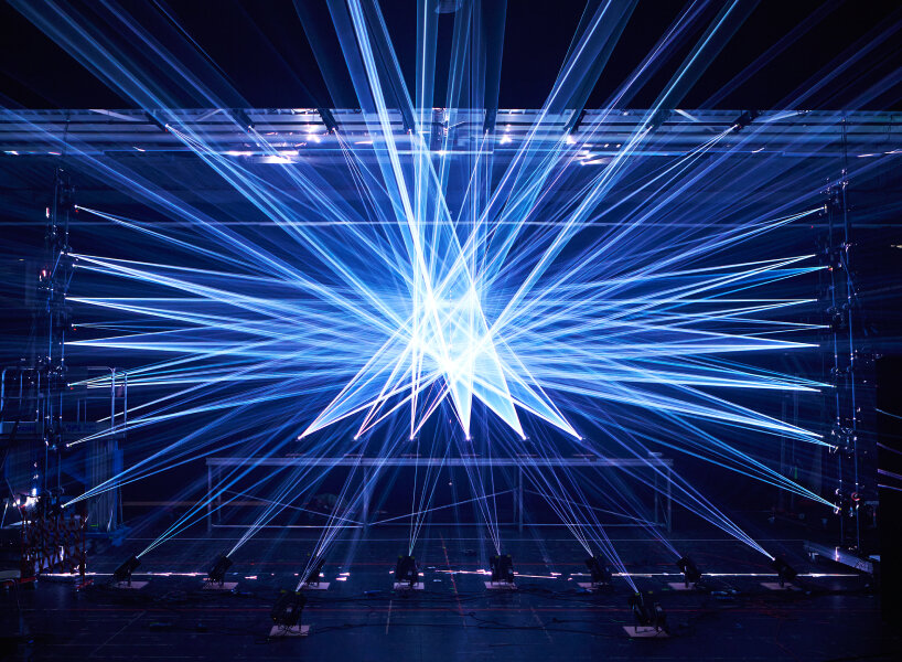 teamLab's kaleidoscopic laser light scenography for opera 'turandot' lands in tokyo