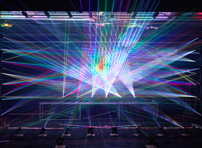 teamLab's kaleidoscopic laser light scenography for opera 'turandot' lands in tokyo