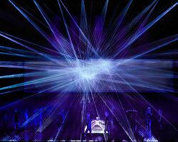 teamLab's kaleidoscopic laser light scenography for opera 'turandot' lands in tokyo