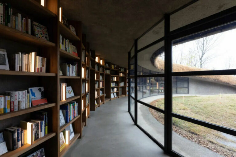 underground library in japan’s kurkku fields invites bookworms in a ...