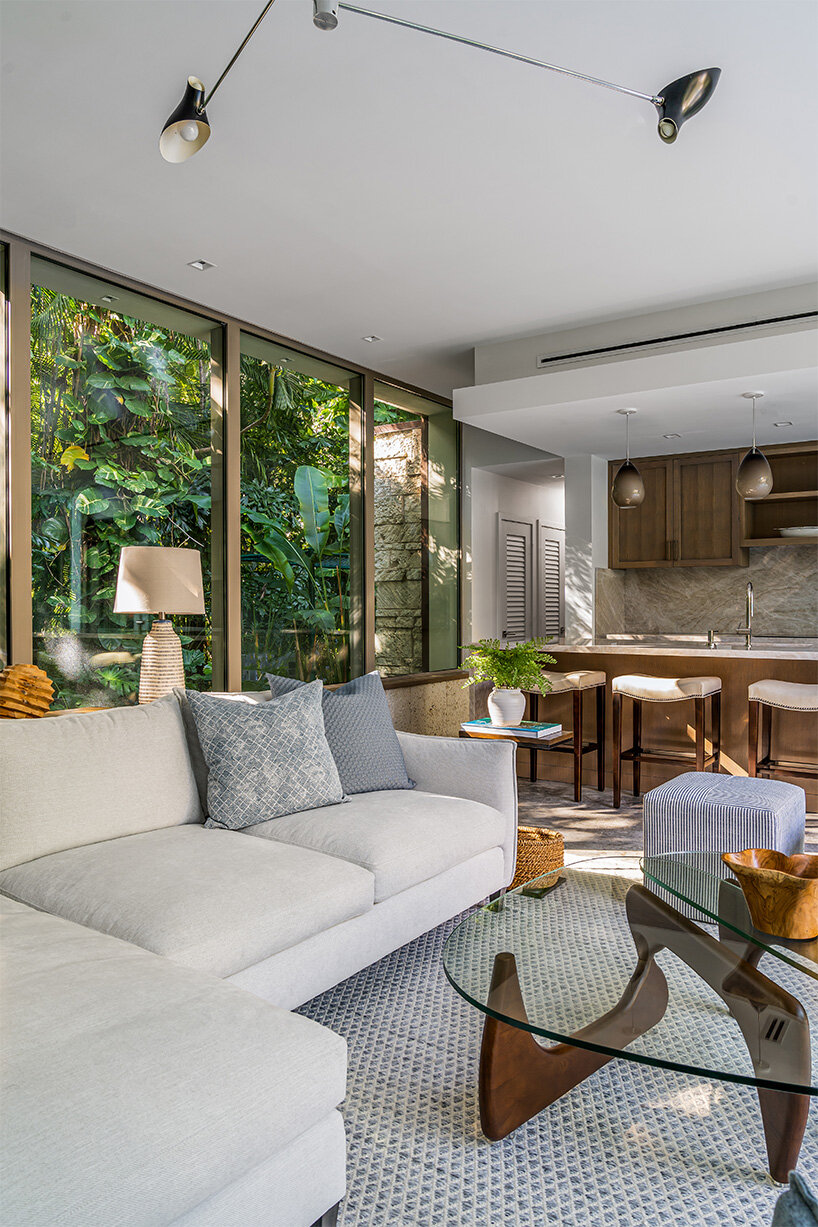 upstairs studio architecture's poolside pavilion nestled in miami backyard
