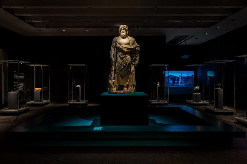 aldo cibic adds Roman sculptures to dark labyrinthine spaces at MAP Shanghai