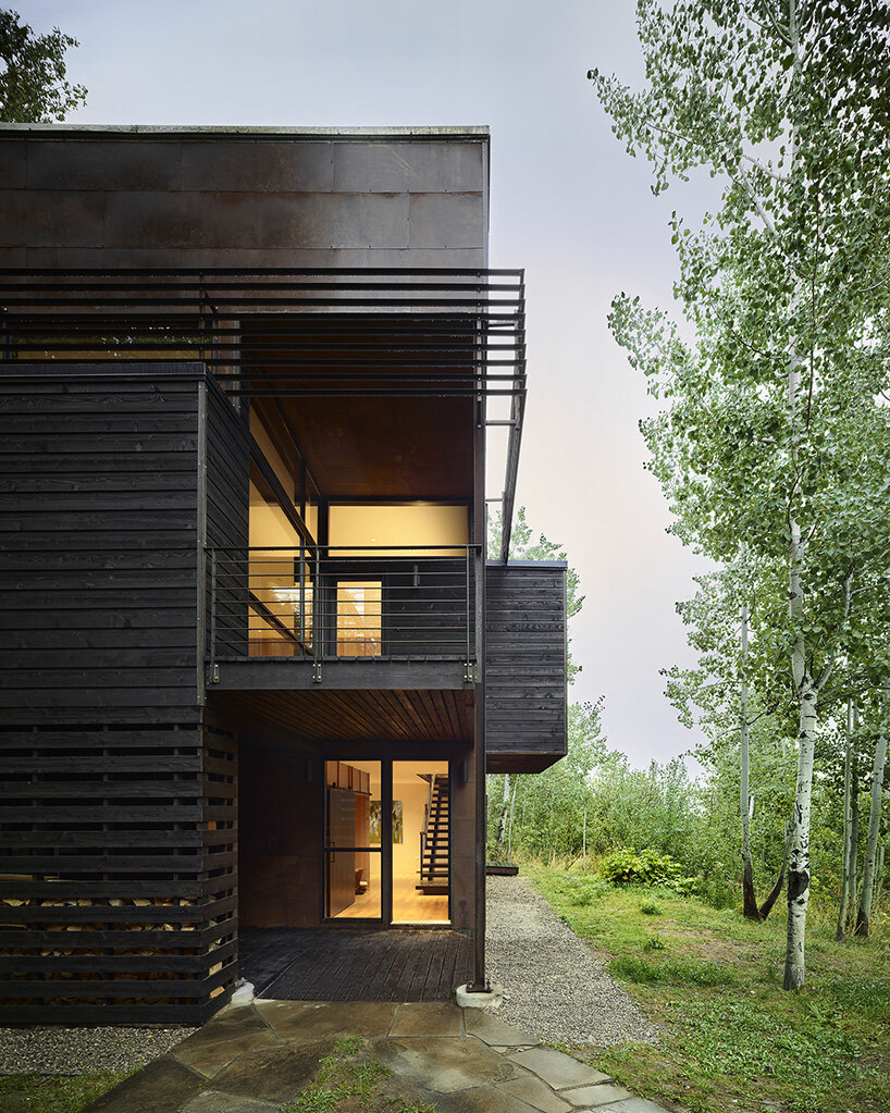 CLB architects' light-filled 'paintbrush residence' emerges from an aspen grove in wyoming