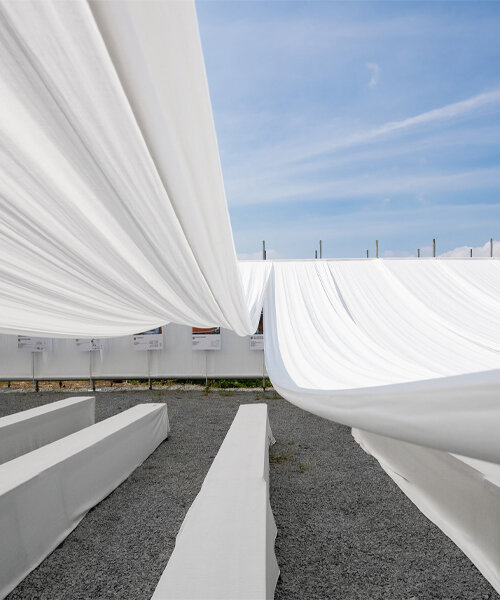 MIA design studio drapes rows of swaying white fabric over new ashui pavilion in vietnam