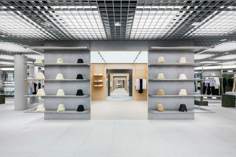 woven bamboo installation by AIM architecture drapes over fashion store atrium in china