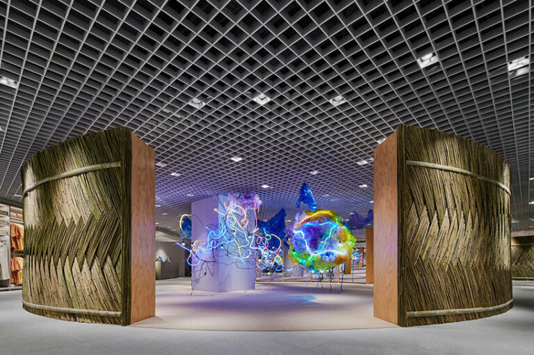 woven bamboo installation by AIM architecture drapes over fashion store ...