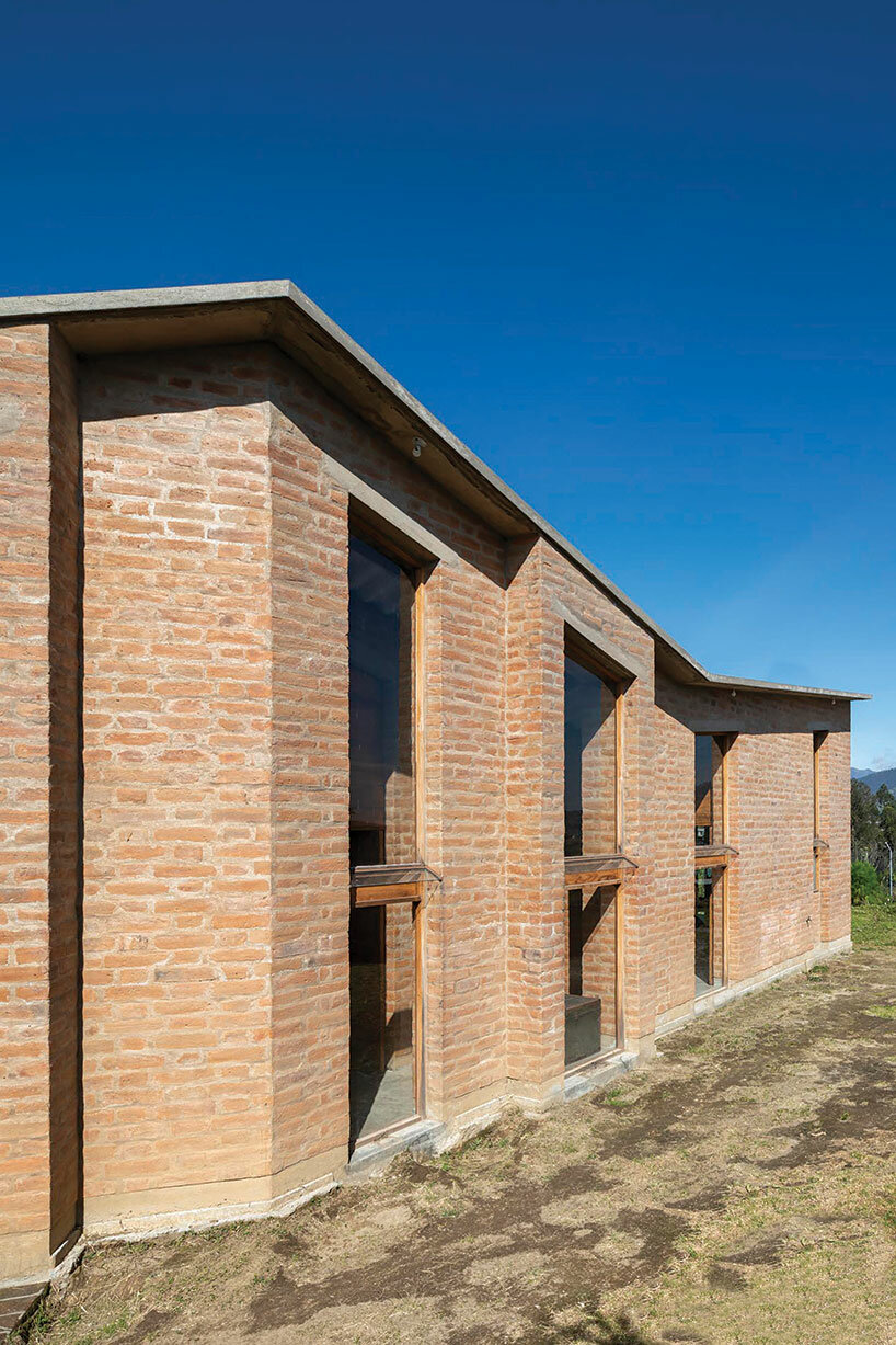 emilio lópez crowns 'casa alangasí' in ecuador with a folded tiled roof