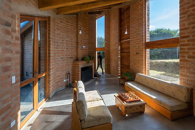 emilio lópez crowns 'casa alangasí' in ecuador with a folded tiled roof