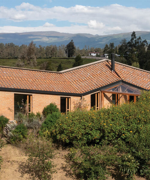 emilio lópez crowns 'casa alangasí' in ecuador with a folded tiled roof