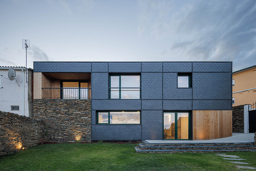 filipe pina converts 19th-century shale masonry structure into modern portuguese home