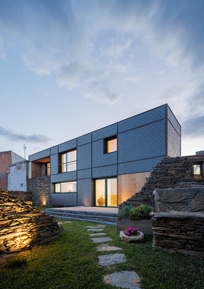 filipe pina converts 19th-century shale masonry structure into modern portuguese home