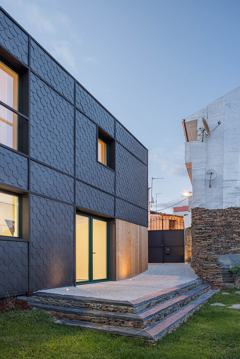 filipe pina converts 19th-century shale masonry structure into modern portuguese home