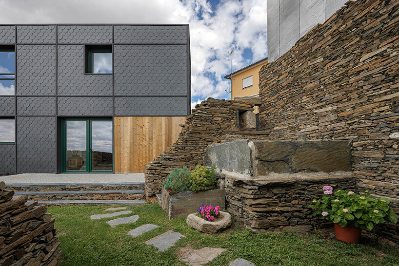 filipe pina converts 19th-century shale masonry structure into modern portuguese home