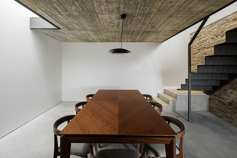filipe pina converts 19th-century shale masonry structure into modern portuguese home