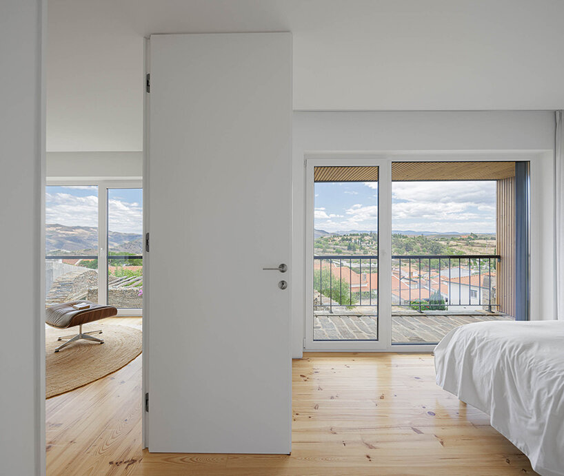 filipe pina converts 19th-century shale masonry structure into modern portuguese home