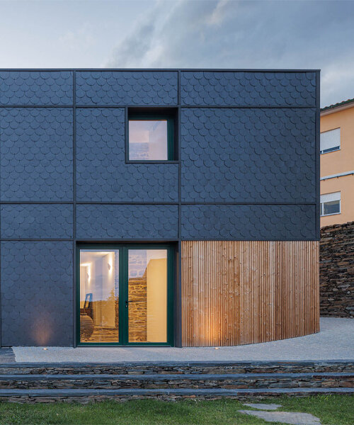 filipe pina converts 19th-century shale masonry structure into modern portuguese home