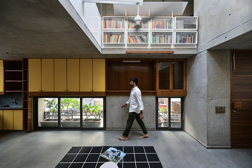 cuts, folds and bends articulate the facades of inpractice's concrete house in india