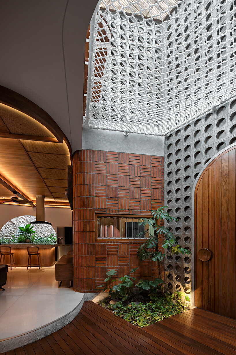 the distracted house's traditional 'joglo' roof protrudes mountain-like peaks in indonesia