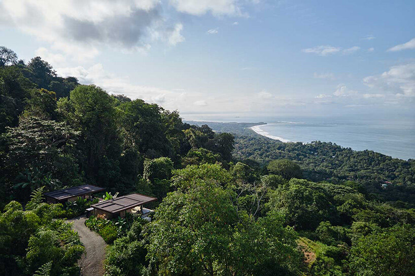 rammed earth villas by formafatal emerge over costa rican coast