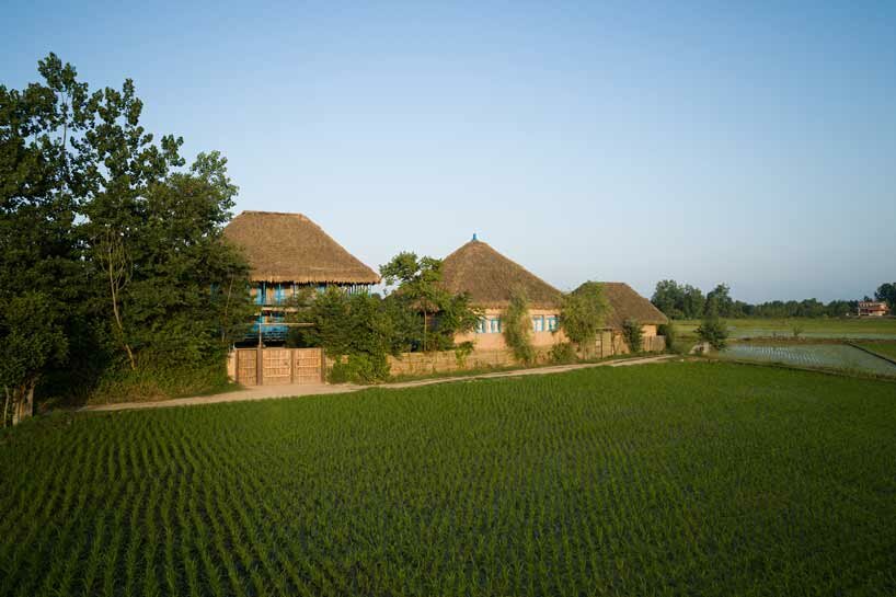 eco-lodge resort in iran stands on repurposed layered beams