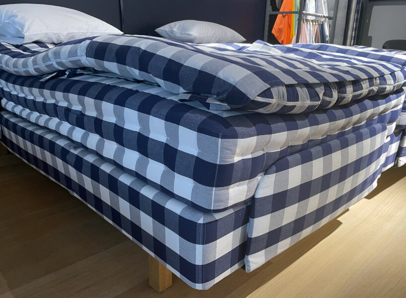 champions 45 years of craftsmanship for its iconic blue check bed and pattern