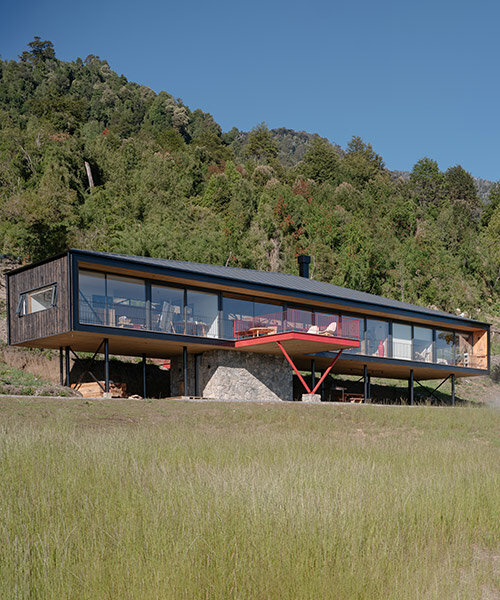 elongated 'la empastada house' frames sweeping vistas of rural chile
