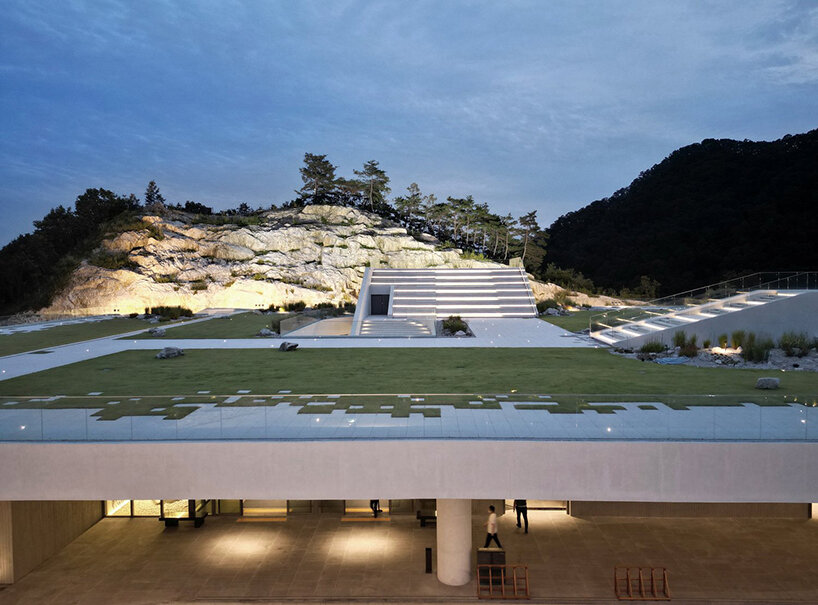 LESS architects weaves new clubhouse into the hilly landscape of wonju in south korea