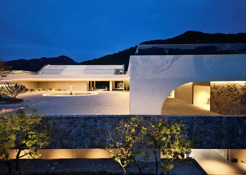 LESS architects weaves new clubhouse into the hilly landscape of wonju in south korea