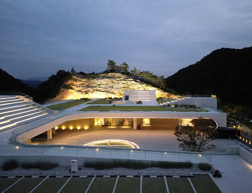 LESS architects weaves new clubhouse into the hilly landscape of wonju in south korea