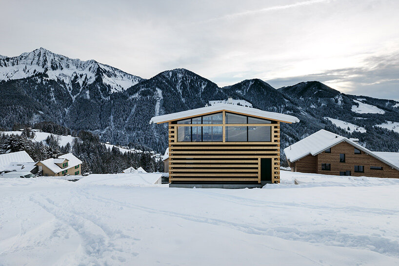 marte marte architects modernizes the traditional austrian log cabin