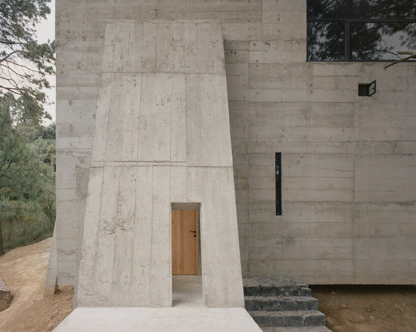 ludwig godefroy perches mysterious monolithic residence in lush mexican forest