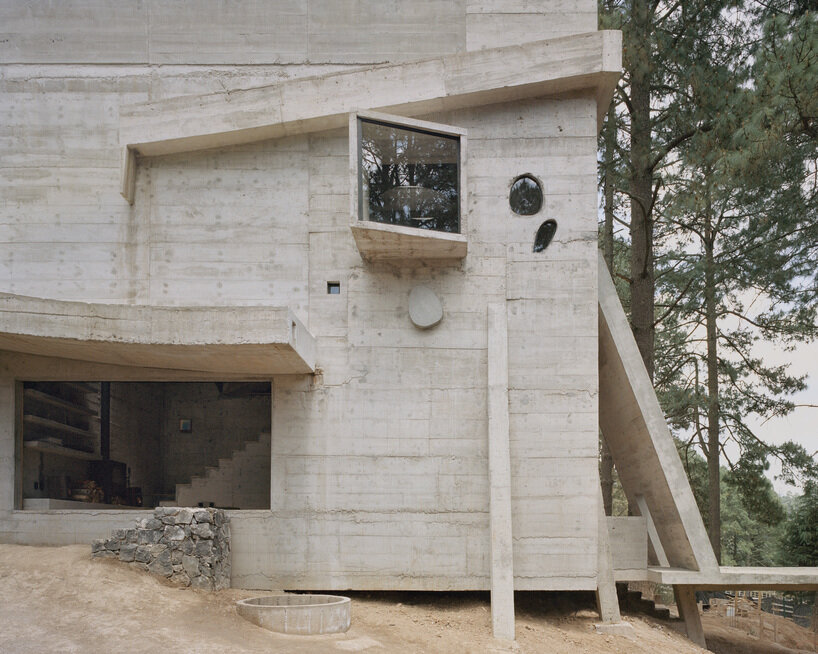ludwig godefroy perches mysterious monolithic residence in lush mexican forest