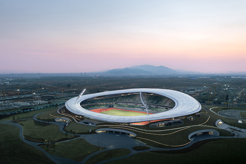 MAD's ma yansong at China's Quzhou Sports Park, the largest earth-protected complex ever built