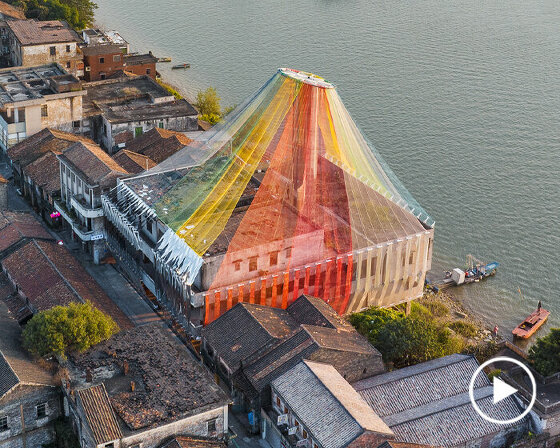 MAD architects wraps abandoned chinese landmark in ethereal veil of multicolored cloth