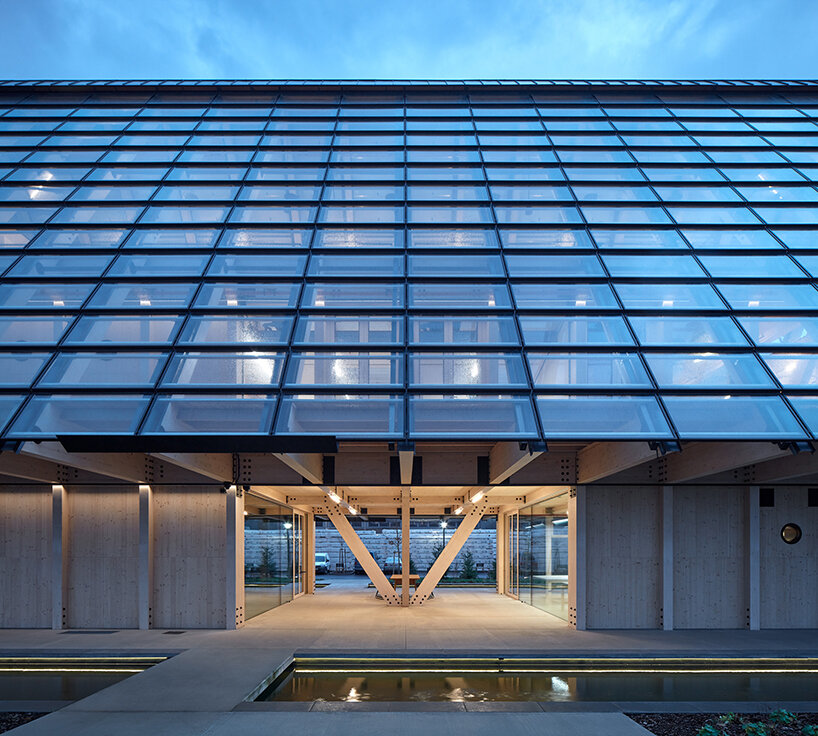 a modular timber shell envelops this new office space by mjölk architekti in czechia