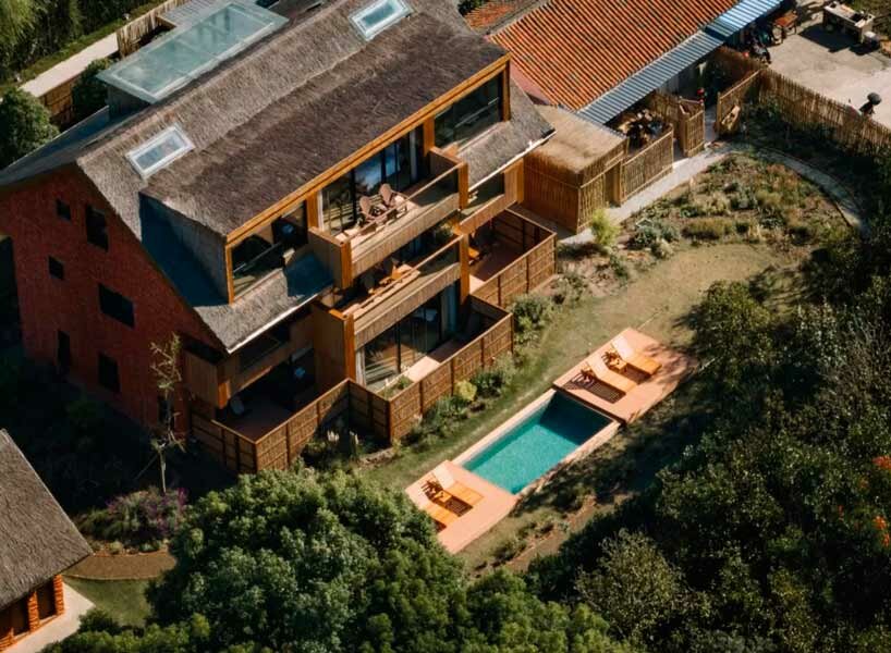 recycled red bricks and reed bundles build up a hostel in shanghai